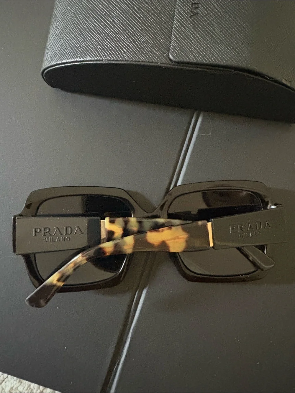 Prada Black Frame Sunglasses with Tortoiseshell Temples